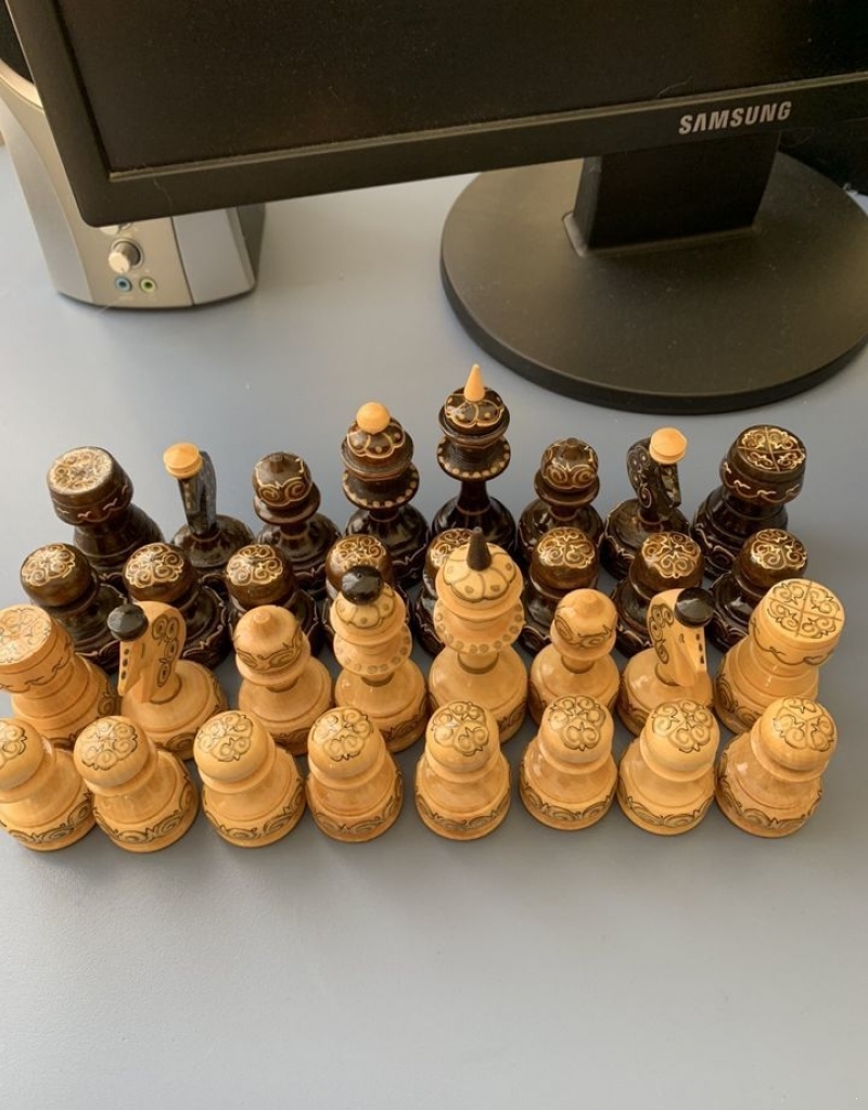 Wooden painted chess pieces