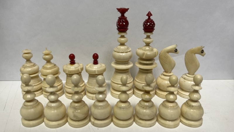 Antique chess pieces. The end of the 19th - the beginning of the 20th century. Made of bone