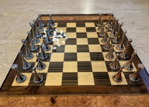 Gift chess with cast metal pieces. Board with internal cells