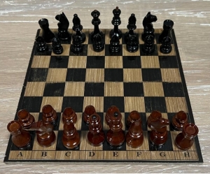 Wooden travel chess with a non-folding board