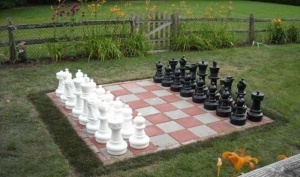 GIANT GARDEN CHESS PIECE. White and black